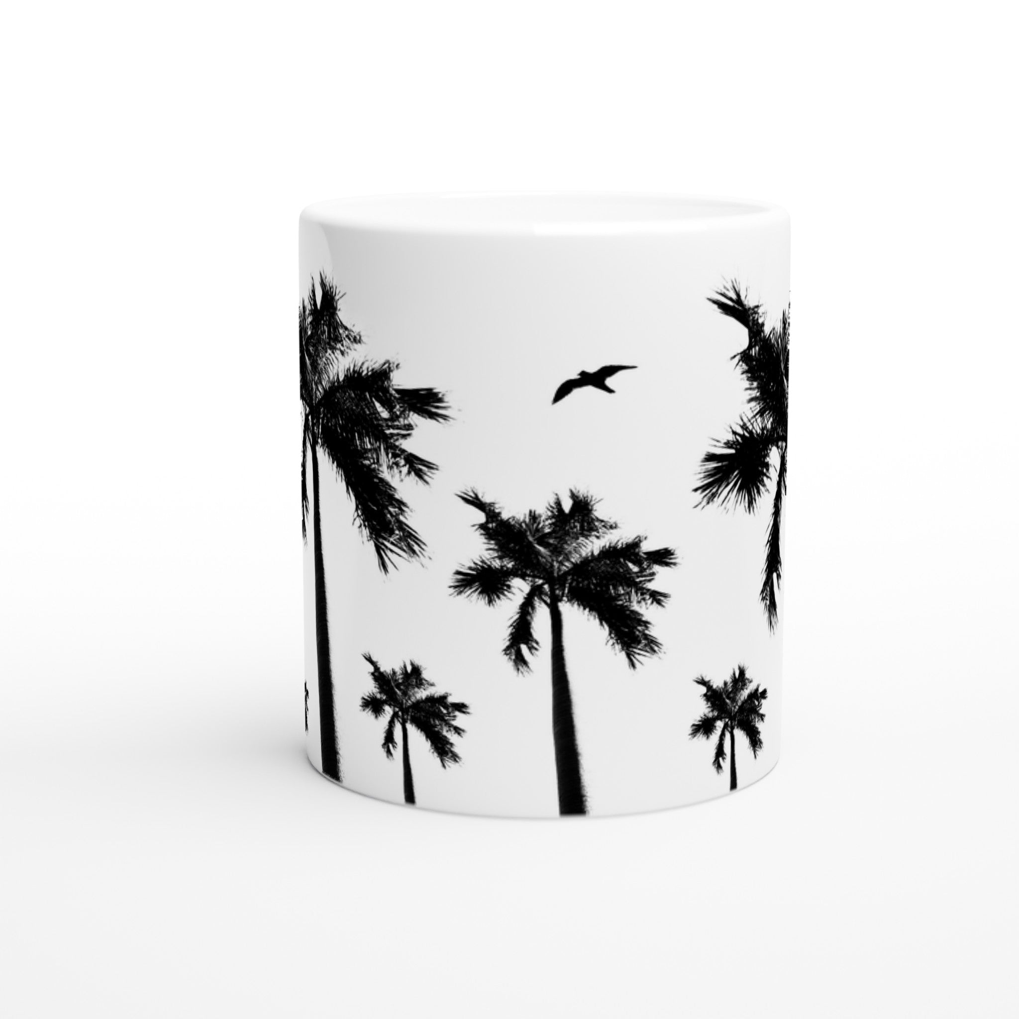 Weiße Keramiktasse mit schwarzem Palmen- und Vogel-Motiv